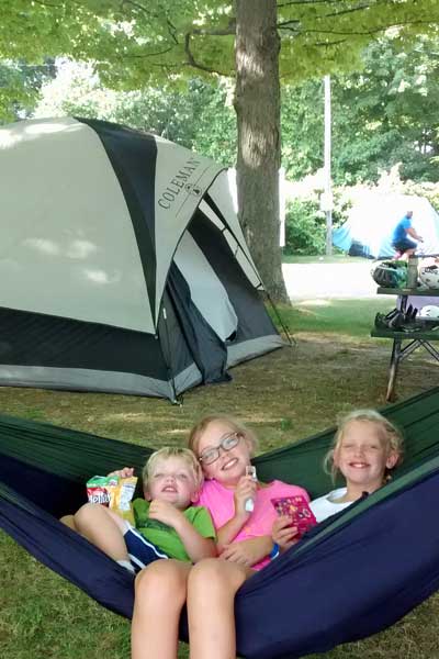 resting in the hammock at john gurney park